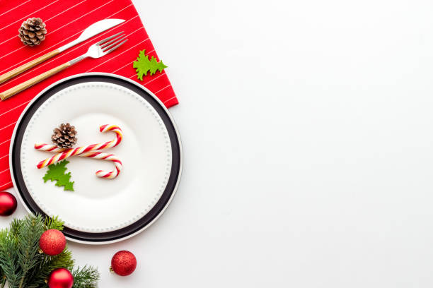 istock Flat lay of Christmas table setting with holiday decorations 1287187671