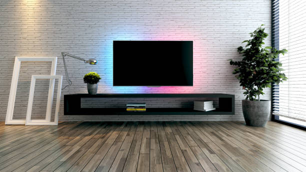 istock Minimalist tv space for modern office or homes. Thought design idea with white brick wall, photo frames, table lamp and plant 3D rendering 1287190454
