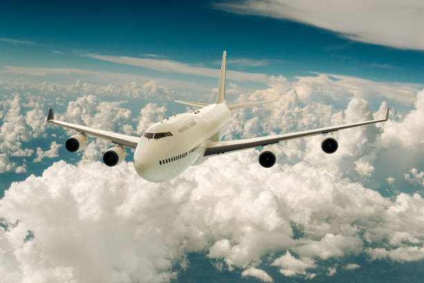 istock A commercial airplane on flight over the clouds. 1287191535