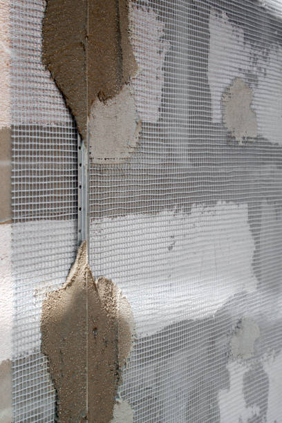 istock surface of wall with applied construction grid and guides for plaster application 1287191786