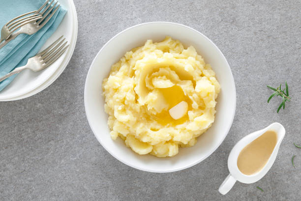 istock Boiled mashed potatoes with butter and gravy 1287197710