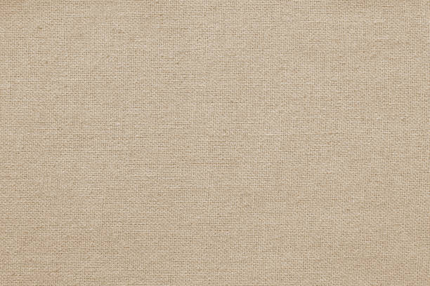 istock Brown cotton fabric texture background, seamless pattern of natural textile. 1287198200