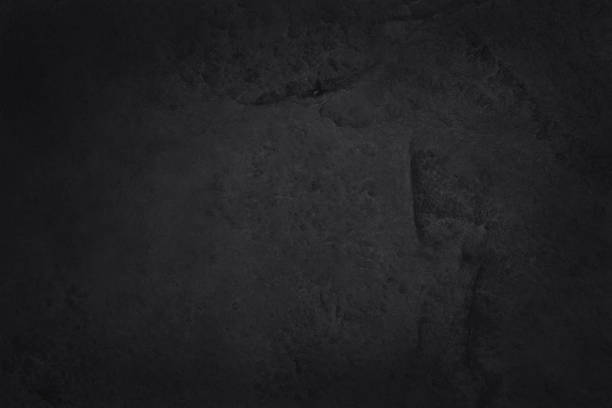 istock Dark grey black slate texture with high resolution, background of natural black stone wall. 1287198239