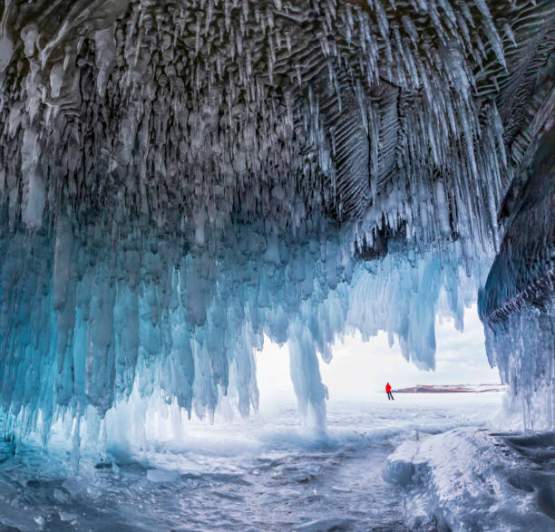 istock Ice Cave, Lake Baikal. Sunny day, winter nature 1287198445