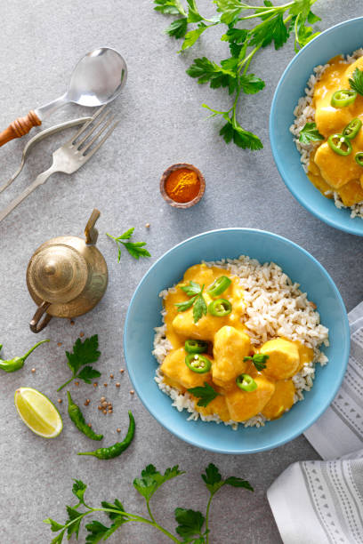 istock Indian chicken tikka masala curry with rice 1287198474