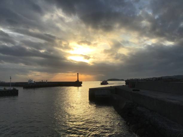 istock Island Port at dusk boat Japan 1287199891