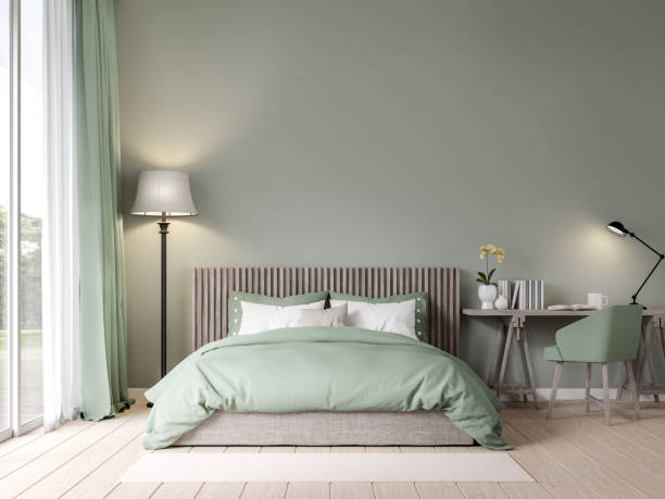 Bedroom in pastel green color with garden view 3D render Bedroom in pastel green color with garden view 3D render , the room has wooden floors, empty painted walls, green fabric furniture, large windows with natural views. green color bedroom wall 