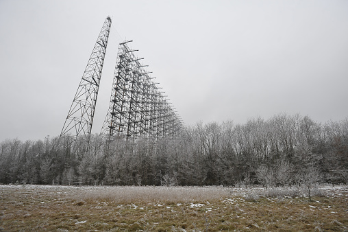 Former military radar system Duga, antenna complex near Pripyat called Russian Woodpecker, Soviet remains of Cold War, summer season in Chernobyl exclusion zone, Ukraine