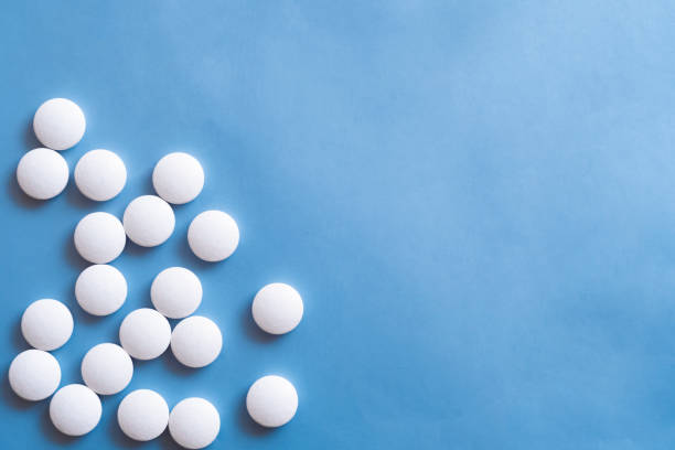 istock White round pills, great design for any purposes. Abstract geometric pattern. Health cure collection. Medicine pill. Medical pharmacy concept. Disease treatment. 1287203001