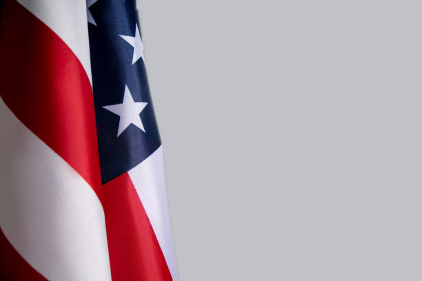 istock Flag of USA on grey background. Copyspace for text, image 1287206129