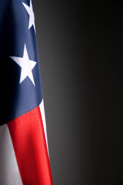 istock Flag of USA on grey studio background. Copyspace for text, image 1287206144
