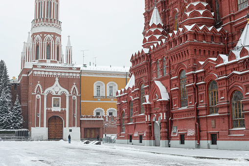 Moscow - Russia, November 23rd, 2020 - The first snow of the year arrived in Moscow and the Red Square is completely covered. Kremlin under the snow.