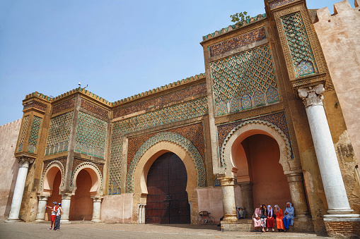 MEKNES, MOROCCO - JUNE 01, 2017: Bab Mansour Gate in Meknes (the gate finished in 1732). Meknes is one of the four Imperial cities of Morocco and the sixth largest city by population in the kingdom.