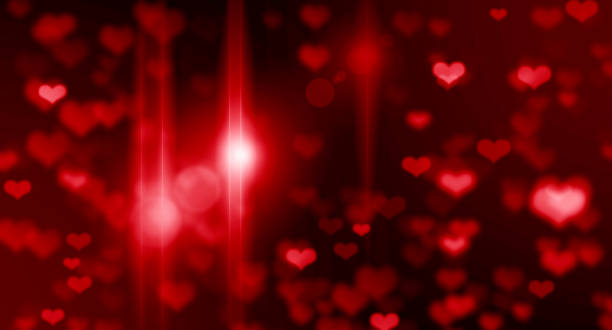 istock Red glitter of broken hearts on black background, Valentine's day 1287212665