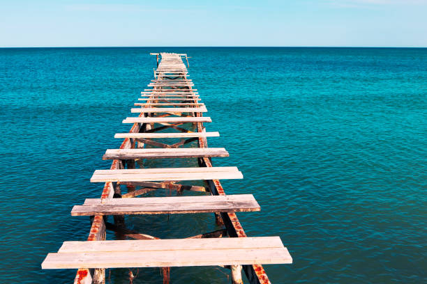 Old berth with broken wooden planks