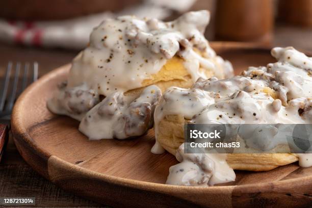 Biscuits And Creamy Sausage Gravy Stock Photo - Download Image Now - Biscuit - Quick Bread, Gravy, Sausage