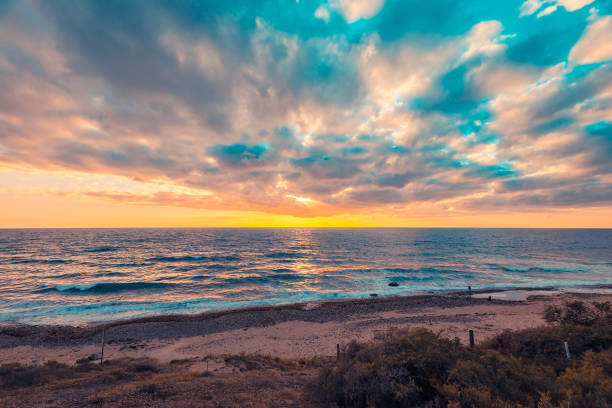 istock Dramatic sunset with clouds viewed from Hallett Cove 1287216963