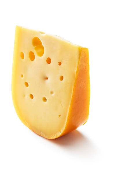 käse: holländischer käse isoliert auf weißem hintergrund - maasdam stock-fotos und bilder