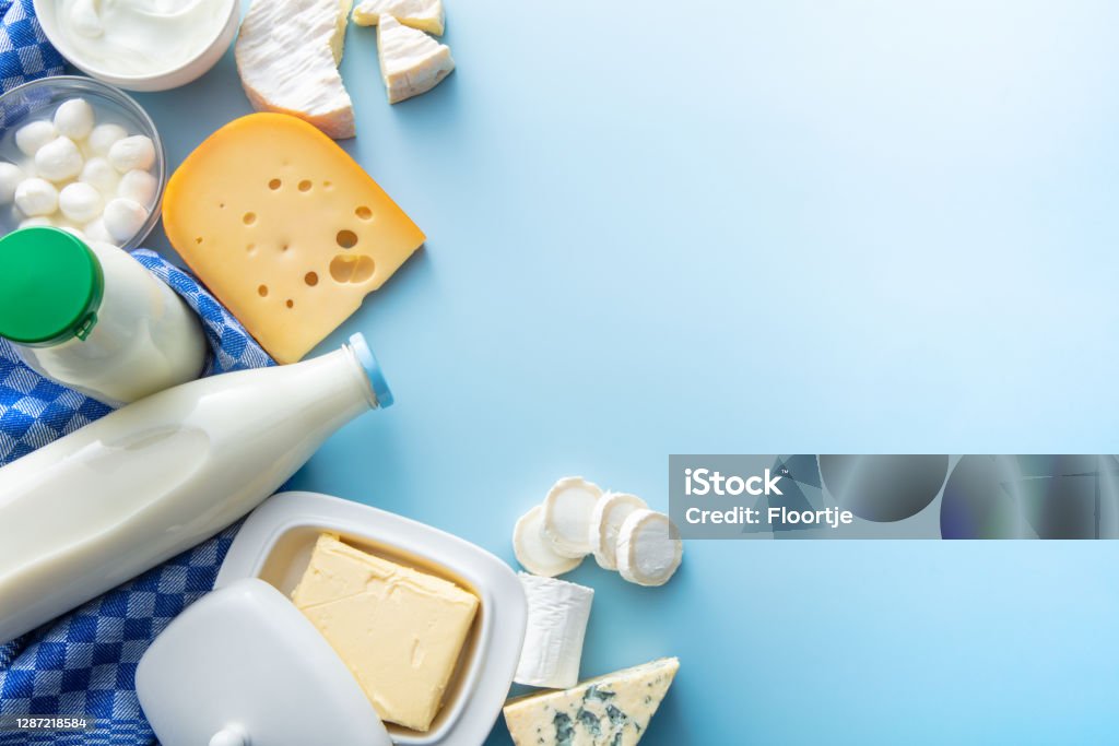 Dairy Products: Dairy Products on Blue Background with Copy Space Dairy Product Stock Photo