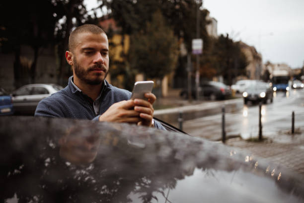 istock A man getting out of the car 1287218792