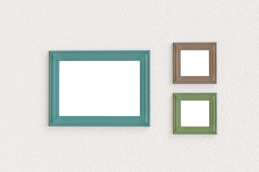 Three blank picture frames hanging on a wall. 3d illustration.