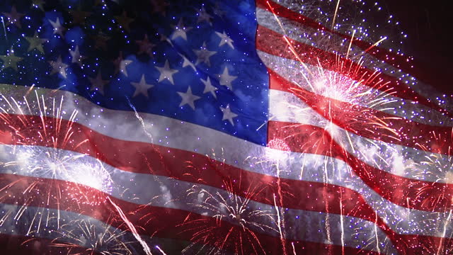 4th Of July background with fireworks on waving USA flag, Celebration Independence Day In America
