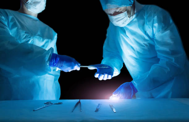 istock Modern surgical operation to remove adenoma of the prostate gland using laser vaporization of the adenoma. The concept of treating diseases with a high-tech diode laser, urology 1287221712