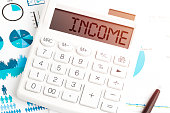 text-income-rechner-stift-und-diagramme-dokumente-und-grafiken.jpg?b=1&s=170x170&k=20&c=-AlZcGjgDJKDh6zzmPT1nq9Q6BjKBM11jukKjh8UKGk=