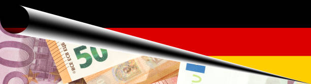 istock Flag of Germany and Euro banknotes 1287229175