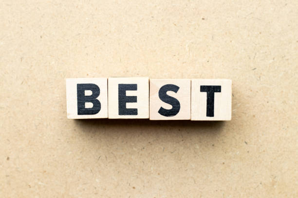 istock Letter block in word best on wood background 1287230428