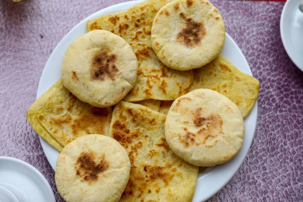 istock Moroccan bread for breakfast - msemen and batbout. 1287233177