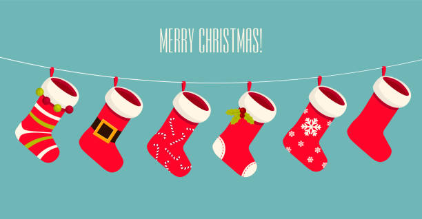 ilustraciones, imágenes clip art, dibujos animados e iconos de stock de bonitos calcetines rojos y blancos de navidad o medias colgando de una cuerda. - medias de navidad