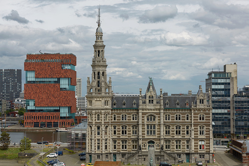 Antwerp, Belgium - June 16, 2017: The Museum aan de Stroom located along the river Scheldt in the Eilandje district of Antwerp, Belgium.