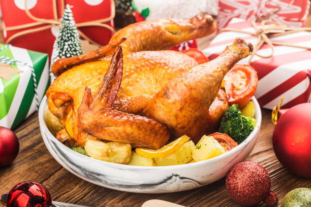 istock Roasted whole chicken with Christmas decoration. 1287233857
