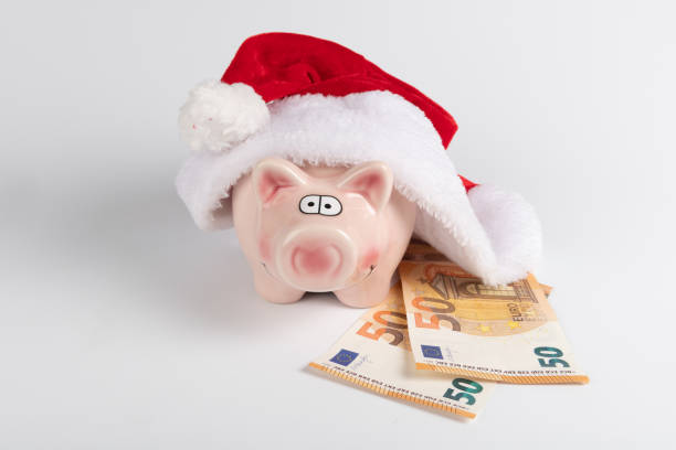 istock Santa's hat and euro money 1287235926