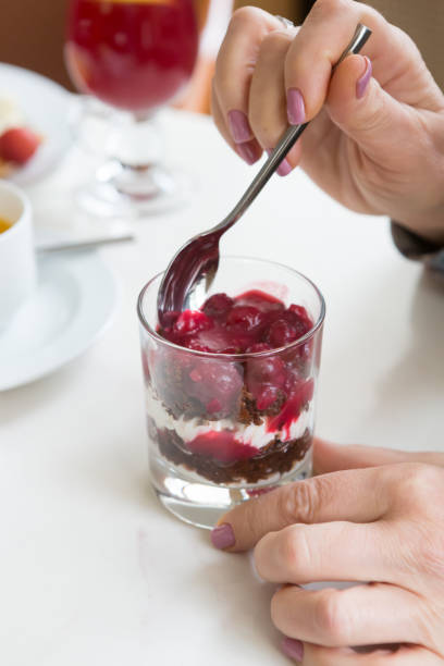 istock Glass of granola with berries 1287237996