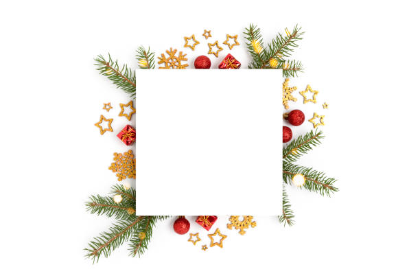 istock Square paper card mockup with frame made of Christmas decorations and spruce branches. 1287238532