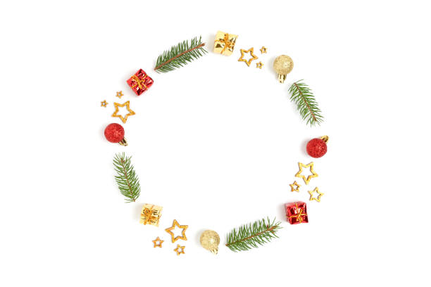 istock Wreath made of colorful Christmas decorations and spruce branches. 1287239672