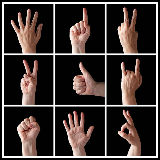 istock Hands up multiple male hand gestures isolated on black background 1287240954
