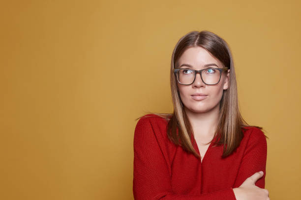 istock Young woman has formal look in studio 1287245785