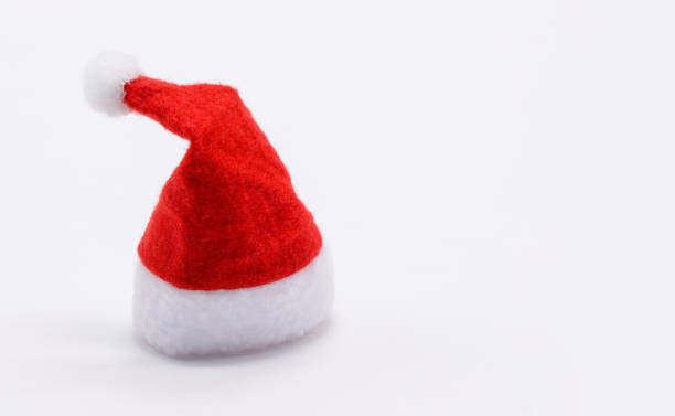 istock Santa's red hat close-up on a white background. Free space for text. 1287246004