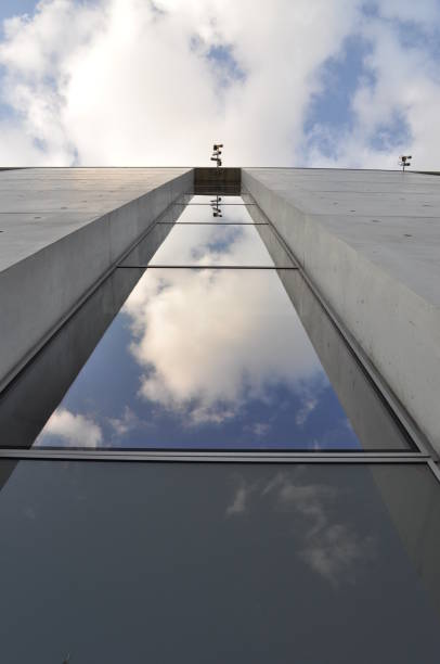 istock a grey wall with a bottom glass window contemoporary modern building 1287246076