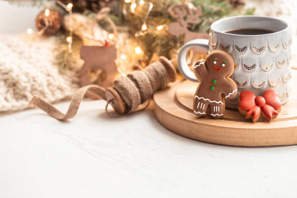 istock Christmas composition with gingerbread boy and beautiful cup with hot drink copy space. 1287247584