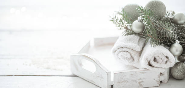 istock Body care composition with Christmas decoration on light blurred background copy space. 1287247728