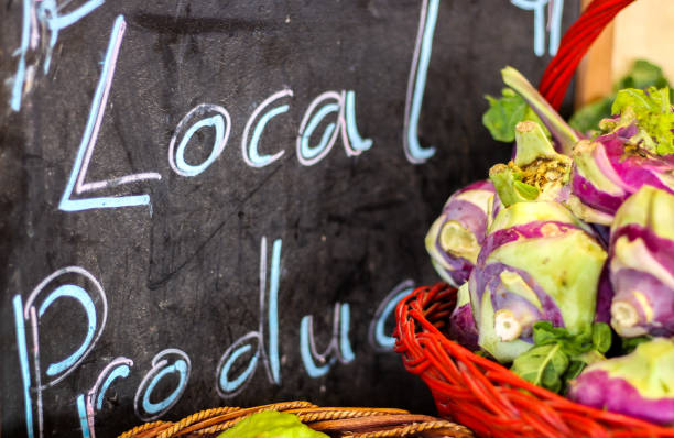 Local produce sign on display, market