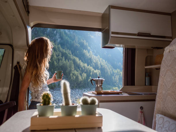 istock Woman enjoys fresh Italian coffee from her van 1287255781