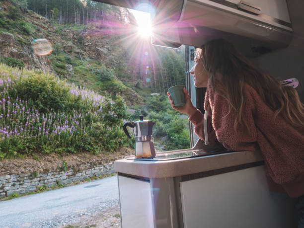 istock Woman enjoys fresh Italian coffee from her van 1287256054