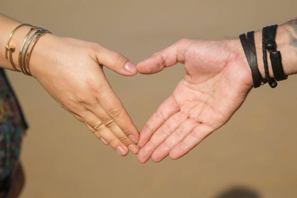 istock palms folded in the shape of a heart 1287257548