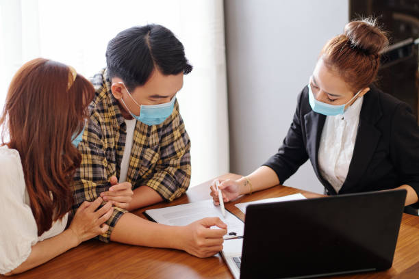 istock Signing landlord tenant agreement 1287260460