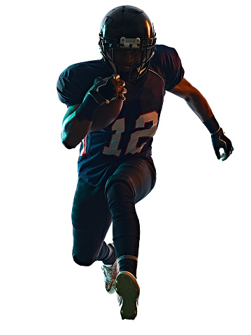 one afro american football player man in studio silhouette shadow isolated on white background